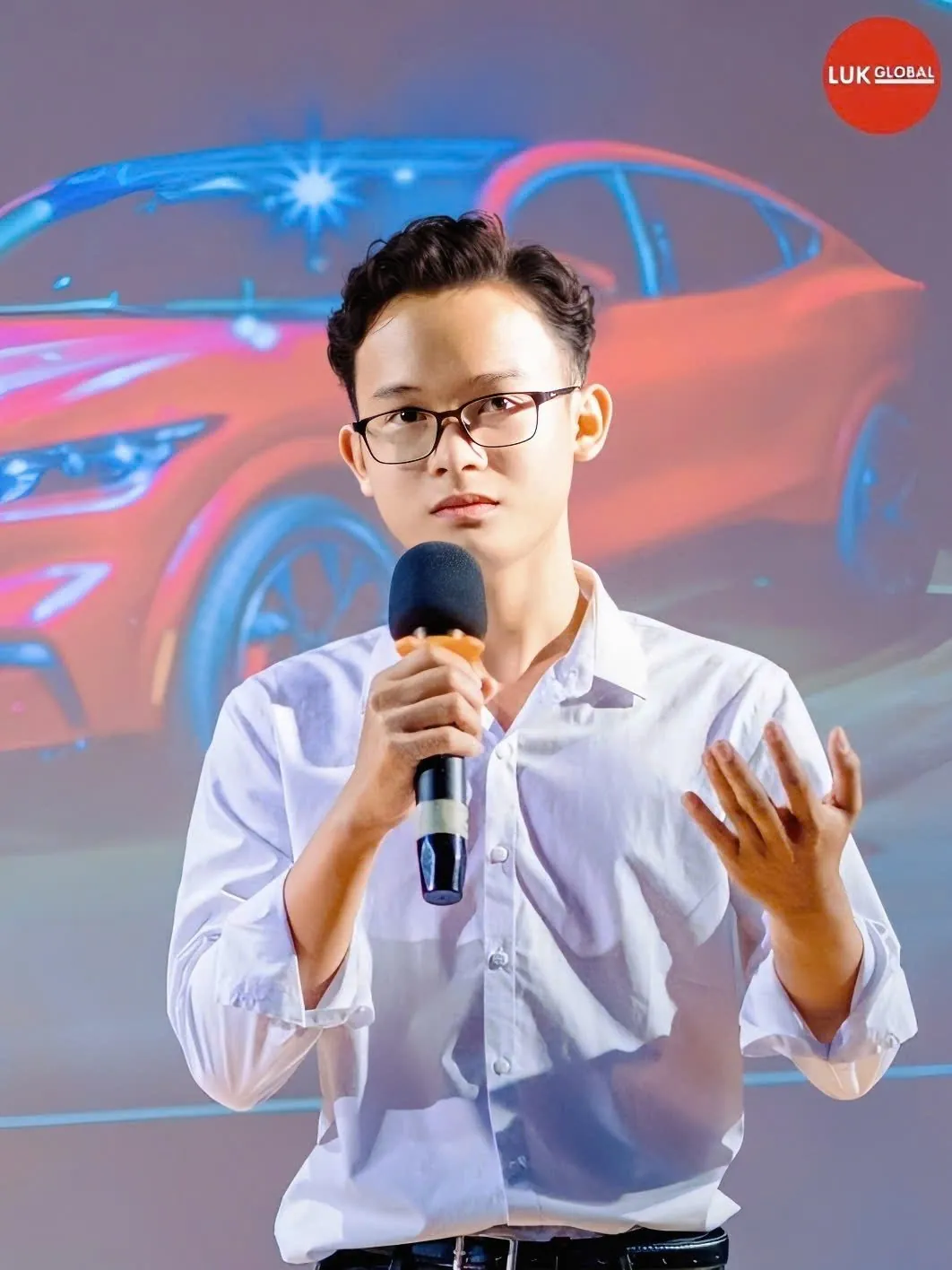 Hung presenting on stage